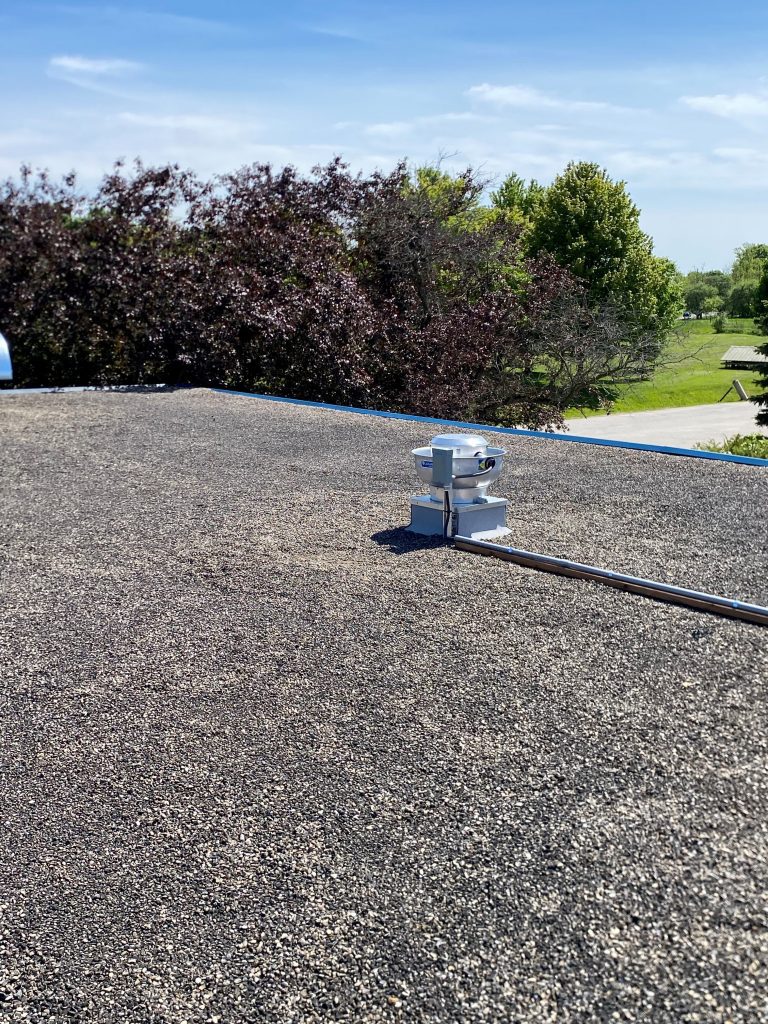 air vent installation on a flat roof