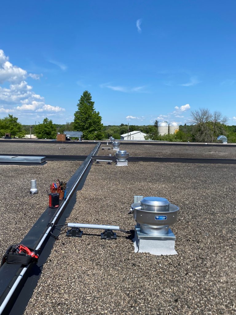 air vent installation on a flat roof