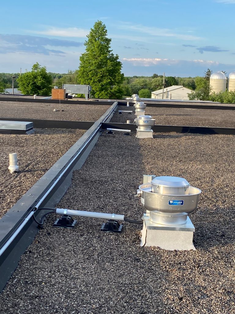 air vent installation on a flat roof